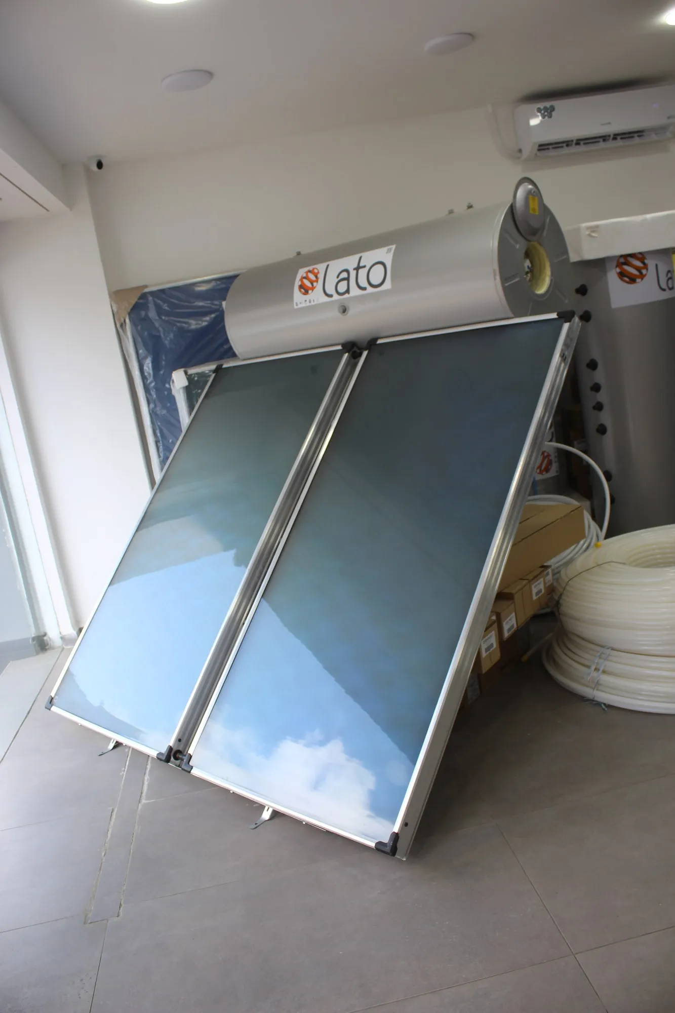 Lato solar collectors and storage cylinder in the Germania showroom